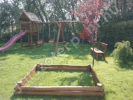 Homokozó rönkfából