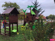 LUXUS játszóvár pálmafákkal és nyugágyakkal